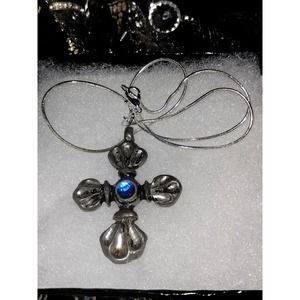 Beautiful sterling silver cross necklace with bright blue stone